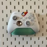 Organize your gaming setup with this pegboard controller holder. Durable, space-saving design perfect for Xbox, PlayStation, and other game controllers - Image 4